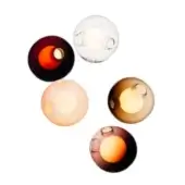 Spherical wall lights, dark gray metal, feature clear glass, red, peach, amber, and yellow textured glass globes with visible bulbs.