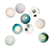 Spherical wall lights, translucent glass, varied colors—white, lavender, teal, blue—with circular openings and overlapping, angled arrangement.