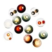 Spherical wall lights, glass, clear, brown, green hues, double-eye & single-opening designs, glossy finish, circular arrangement, studio lighting.