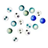 Glass spheres with blue and green circular designs arranged against a white background, including two solid deep blue spheres.