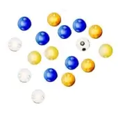 Glass orbs in blue, amber, and clear tones are randomly arranged on a white surface, displaying mottled and marbled textures.