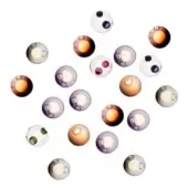 Spherical pendant lights, translucent glass and varied colors, arranged in a loose circular composition against a white backdrop.