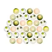 Thirty-six translucent spheres in pale green, peach, gray-green, and clear form a tight circular pattern on a white background, each with a dark green rim.