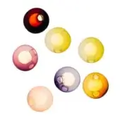 Translucent spheres in red, yellow, green, rose, lavender, and orange display circular indentations, arranged against a white backdrop.