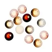 Spherical glass light fixtures in amber, rose, gray, burgundy & white tones are clustered against a white backdrop, each with a circular opening emitting warm light.