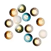 Wall-mounted lights, translucent glass, thirteen spheres in amber, olive, gray, teal, and off-white, overlapping circular arrangement.