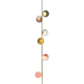 Floor lamp, brass finish, slender column with eight glass globes in teal, amber, peach, and pink hues, black cord with foot switch.