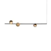 Suspended light fixture, black cord, three glass pendants – amber, gold, gray – with hand-blown, organic shapes and subtle ripple texture.