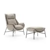 Distinctive Ditre Italia Beetle lounge chair with footrest in textured light beige fabric and slender matte dark metal legs