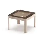 Carrom table, beige wood frame, square felt playing surface with brown border, four corner pockets, two white carrom pieces visible.