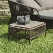 Exceptional Varaschin Cricket side table with bush-hammered ceramic top and dark brown hand-woven synthetic fiber frame