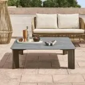 Superior Varaschin Plinto coffee table with dark gray bush-hammered ceramic tabletop and powder-coated aluminum legs