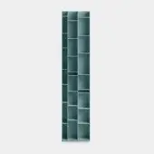 Shelving unit, teal-green, asymmetrical modular design with square and rectangular compartments, matte finish, solid construction, light gray background.