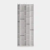 Modular shelving unit, matte white finish, asymmetrical cubby arrangement with open and closed compartments, vertical and horizontal panel construction.
