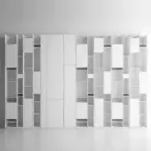 Modular shelving unit, white laminate, asymmetrical cuboid arrangement with open and closed compartments, integrated drawers, and horizontal accents.