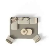 Modular sofa, light gray fabric, three sections with pillow; gray rug, circular coffee table, beige tones; four tan wood armchairs.