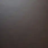 Dark brown matte surface with subtle tonal gradient, displaying slight color variations and a diffused, even lighting scheme.