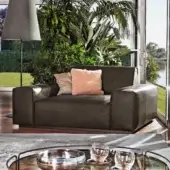 Sophisticated Ditre Italia Monolith lounge chair with dark brown textile and light brown peach cushions offers a harmonious design