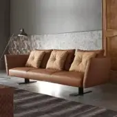 Exceptional Presotto Saint Barth sofa with warm brown leather upholstery and refined Peltro metal base
