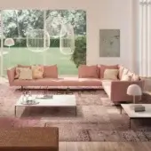 Distinguished Presotto Saint Barth sectional with muted pink textile upholstery and metal Peltro base, crafted with matt lacquered coffee tables