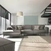 Elegant Ditre Italia Kris sectional with smooth matte gray textile upholstery and stylish metal feet
