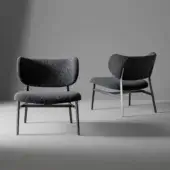 Sophisticated Bonaldo Noor lounge chair with subtly curved backrest upholstered in textured dark gray textile and matte metal base
