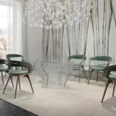 Exceptional Reflex Angelo Dune table with extra-clear glass layers, shiny steel joints, and polished oval glass top