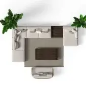 Beige modular sectional sofa with wood accents on gray textured rug, paired with dark wood coffee and side tables, flanked by banana trees.