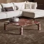 Exceptional Bonaldo Magic coffee table with red and white marbled top and cylindrical legs crafted with dark metal brackets
