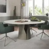 Distinguished Cattelan Italia Giano table with round spatulate clay top and unique muted metal pedestal base