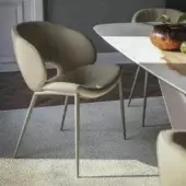 Distinguished Cattelan Italia Miranda ML chair upholstered in smooth beige textile-like material with slender steel legs