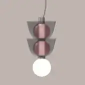 Pendant light, gray and rose gold, features three conical shades and spherical elements suspended on a dark gray cord.