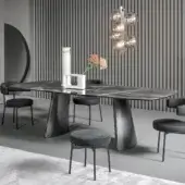Superior Bonaldo Torii table with glossy marble top and inclined metal base creating a visually balanced silhouette