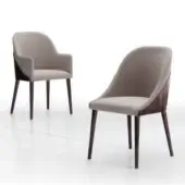 Sophisticated Costantini Pietro shell chair upholstered in light beige textile with dark-toned wood frame