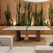 Innovative Vismara Egeo table with ceramic stone effect top and concrete effect lacquered legs