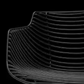 Flowfilo chair, black nickel metal, woven grid back with curved upper edge and matte opaco finish against black background.