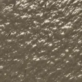 Bronze fused glass texture with undulating ridges, scattered highlights, and diagonal fissures creating a dynamic, muted bronze and dark tone.
