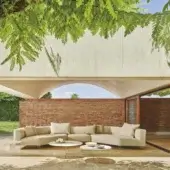Sophisticated Varaschin Belt Air sectional with light beige textile upholstery and sleek aluminum supports