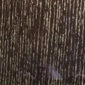 Spigato oak – moka wood texture with vertical golden-yellow striations, displaying a linear pattern and smooth, earthy tone.