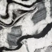 Silver Rift Touch texture with swirling white, gray, and black bands evoking geological formations and a rough, matte finish.