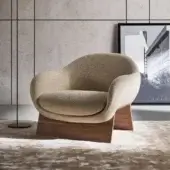 Elegant Bonaldo Boolean lounge chair upholstered in light beige textured fabric with veneered wood and metal base