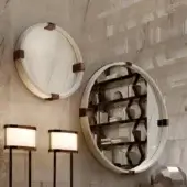 Elegant DV Home Collection Manhattan mirror with a circular design showcasing white marble-like interior and dark bronze accents crafted in Italy
