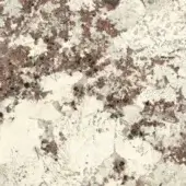 Alaska White texture sample, cream base with brown and dark gray mineral inclusions, rough granular surface, natural stone appearance.