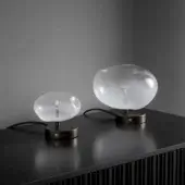 Distinguished Bonaldo Pepita table lamp with silk glass lampshade and dark bronze or gray metal base crafted in Italy