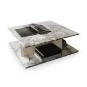 Elegant 4 Mariani Park coffee table with swirling white and light brown marble top and saddle leather base, showcasing a glossy finish