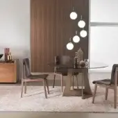 Distinguished 4 Mariani Babette chair with articulated wood frame upholstered in supple leather and medium-brown finish