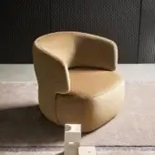 Superior Bonaldo Doge lounge chair with rounded form upholstered in light brown fabric and built with an upholstered base