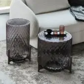 Distinguished Cattelan Italia Dodo side table in smoked crystal with criss-crossing rhombi and matte metal legs