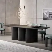Distinguished Bonaldo Louver table with wooden construction, curved lines and dark matte finish creating sculptural legs