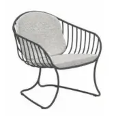 Lounge chair, dark gray metal frame, curved back with light gray cushion, thin black legs, studio product shot, white background.